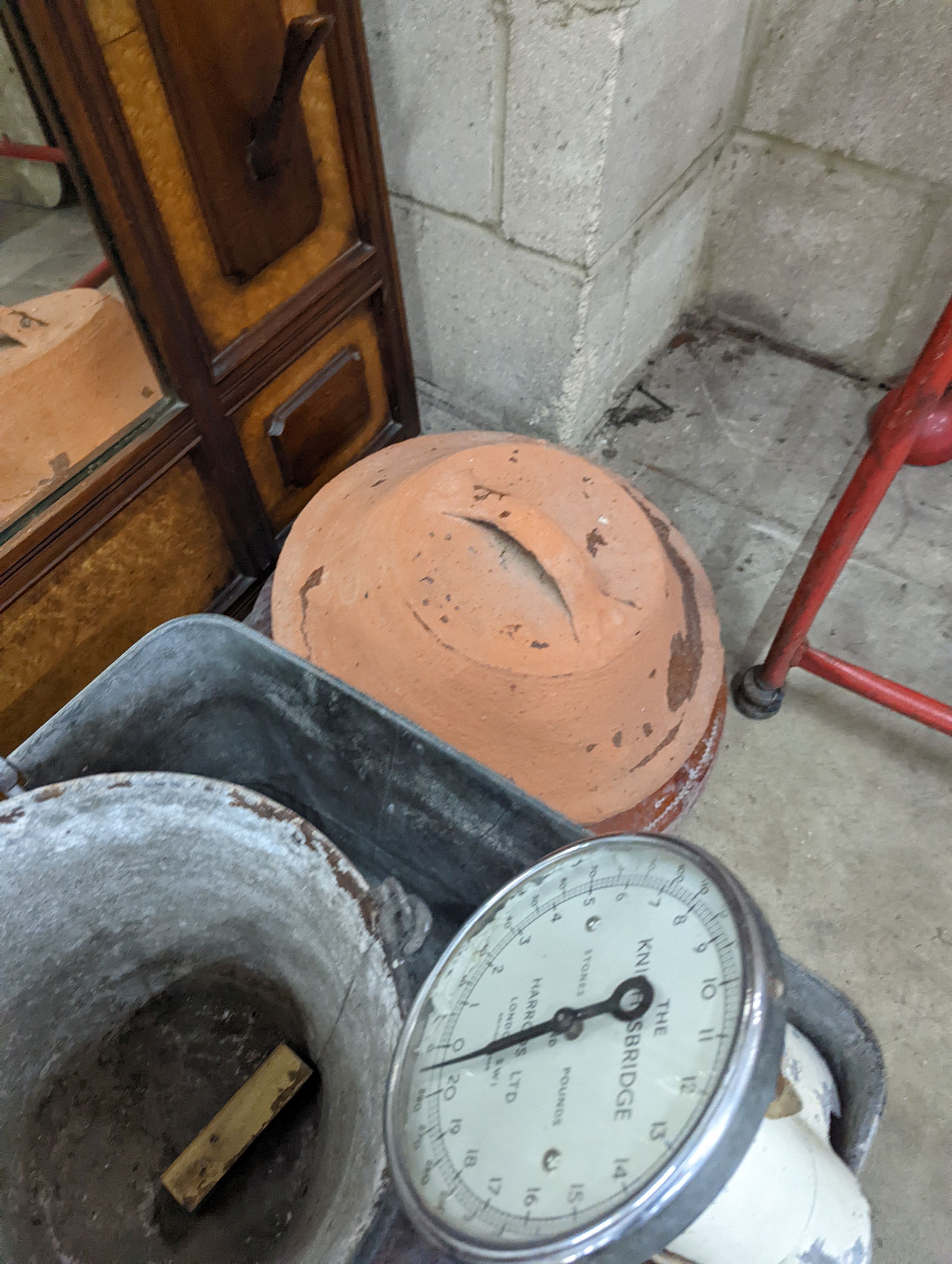 A rectangular galvanised tub, scales bucket, fender, etc.